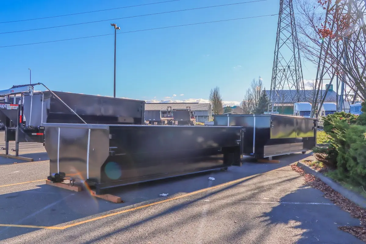 Roll-off dumpster ready for waste disposal at job site for 2 Yard Dumpster Rental in Hamlin